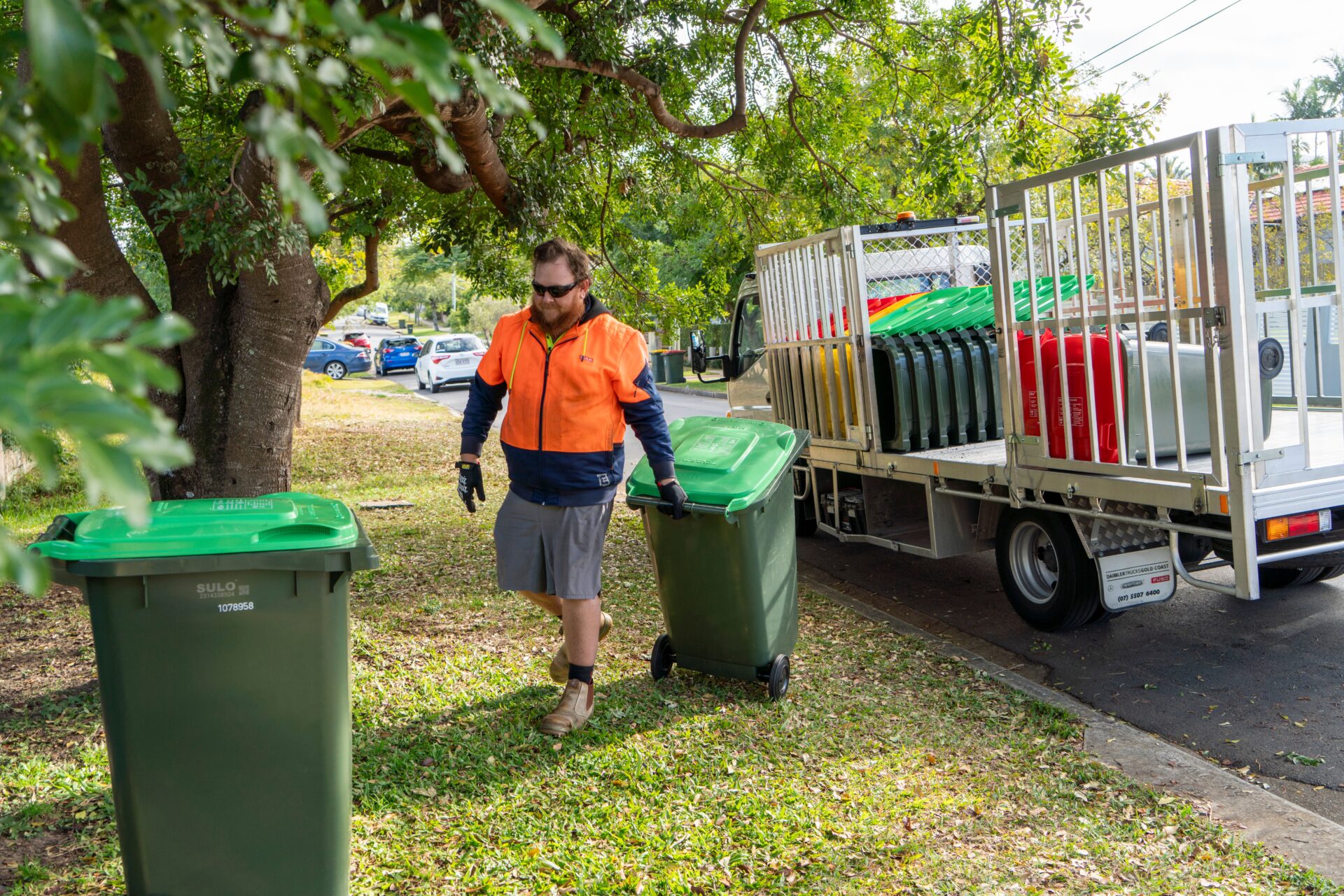 Brisbane residents snap up green bins after fees slashed Australian